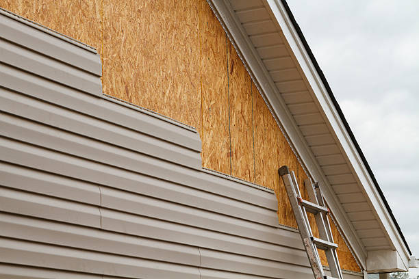 Professional Siding technician working in Bedminster, NJ